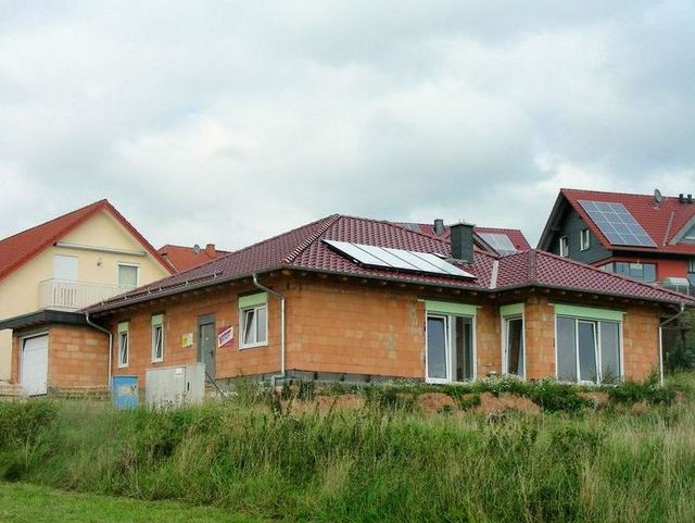 Wohnhausneubau Tonziegel kupferbraun engobiert