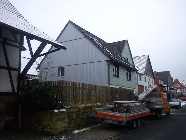 Fassadenbekleidung Einfamilienhaus mit Sinuswelle