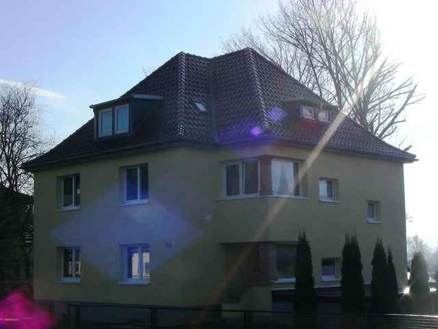 Dacheindeckung Walmdach Tonziegel kupferrot engobiert